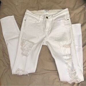 Frame le skinny white distressed jeans